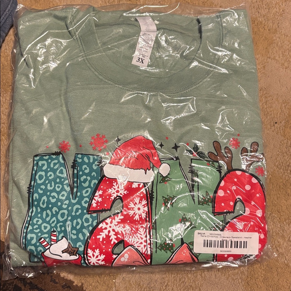 Festive Graphic Nana Christmas Sweatshirt with Santa Hat and Reindeer Design
